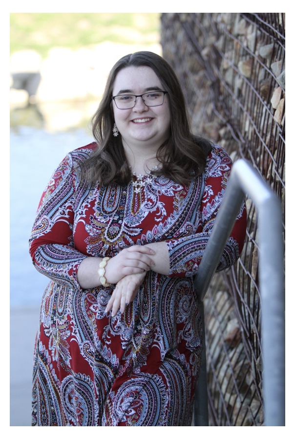 about me me leaning on railing